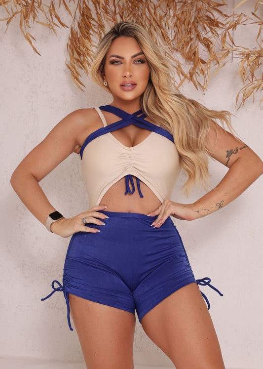 Macaquinho Fitness Top Bege Alça Cruzada Frontal e Short Azul