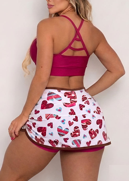 Conjunto Fitness Top Viés Magenta Short Saia Coração